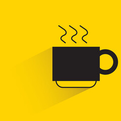 hot coffee cup with shadow on yellow background