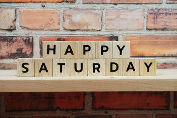 Happy Saturday alphabet letter on shelves wooden background