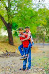 Fototapeta premium Holi celebrations -Indian little boy playing Holi and showing face expression.