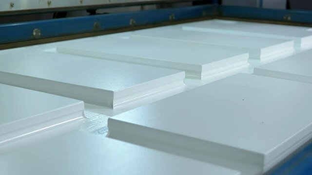 Closeup Of Wood Being WrappedIn PVC In A Industrial Vacuum Press, Manufacturing Industry