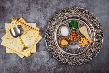Jewish matzah, kiddush and seder with egg, bone, herbs, walnut. Passover concept.