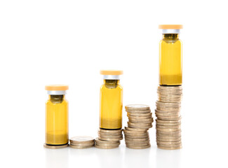 A row of increasing euro coins and medical drugs on a white background