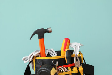 Set of construction tools on color background, closeup