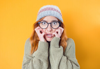 Mistake. Frightened young woman stare to you, isolated on white background