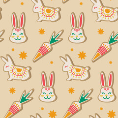 Seamless pattern with rabbits and carrots. Easter elements on beige background