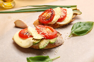 Board with fresh tasty bruschettas, closeup