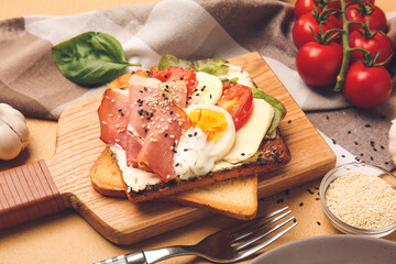 Wooden board with fresh tasty bruschetta, closeup