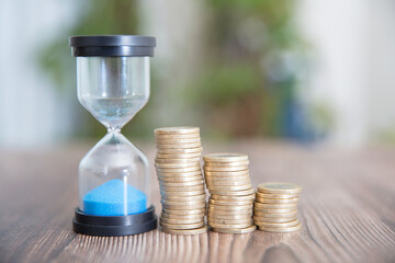 Hourglass timer and euro coin