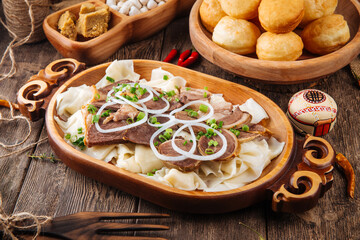 Kazakh traditional dish beshbarmak with horse meat and boiled dough