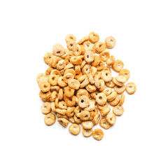 Heap of tasty cereal rings on white background