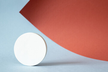 Geometric shape on a blue background, for the presentation of products, abstract geometric background with a pedestal