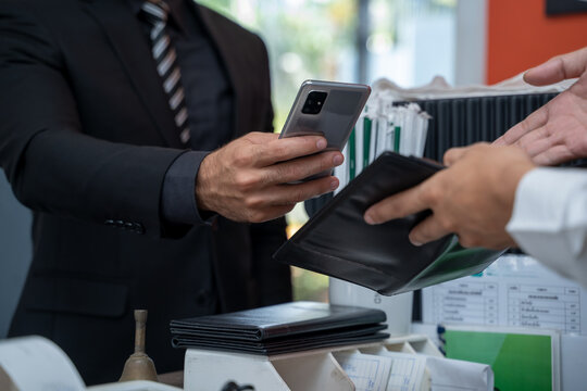Customer pay coffee drink by mobile phone in cafe,Billing payment.