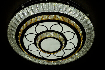 More modern ceiling ceiling with embedded lights and stretched ceiling insert, lights switched on