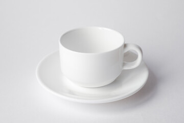 white cup on white background