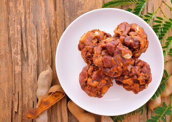 Tamarind on wooden background