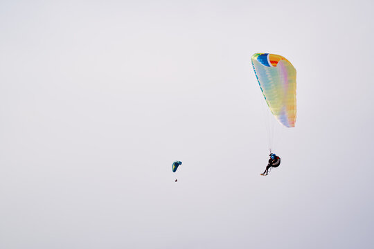 Paraplane on the blue sky background, leisure activity.