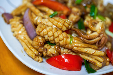 Chinese home cooking, fried squid with colored pepper