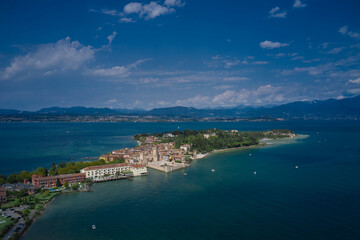 Fototapeta premium Rocca Scaligera Castle in Sirmione Lake Garda Italy. Aerial view.