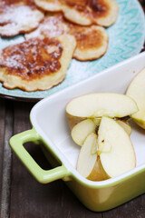 Traditional apple fritters on the plate.