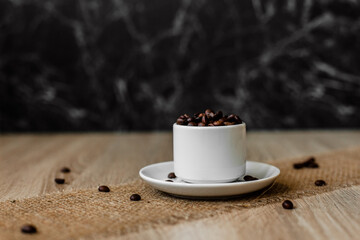 Coffee beans in a cup