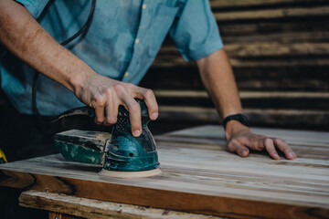 carpenter working on a board