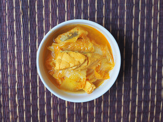 Fish (sea bass) with vegetable spicy soup, Asian food