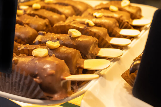 Pastry shop with variety of donuts, muffins, creme brulee, cakes