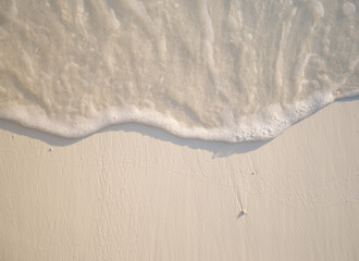 Clear and transparency of sea ocean on the sand beach