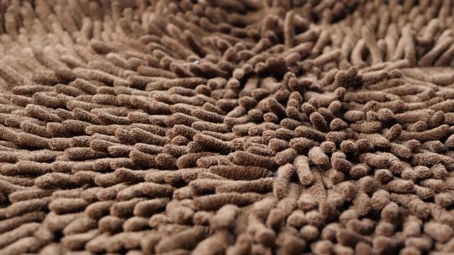 Brown micro fiber soft carpet. True macro close up, domestic texture. High absorbent fabric
