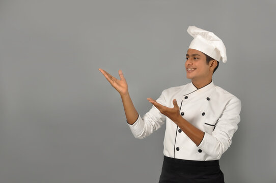 Indian chef standing in the kitchen Stock Photo by ©realinemedia 99236620