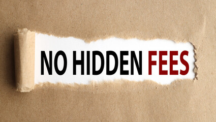 No Hidden Fees . text on white paper over torn paper background.