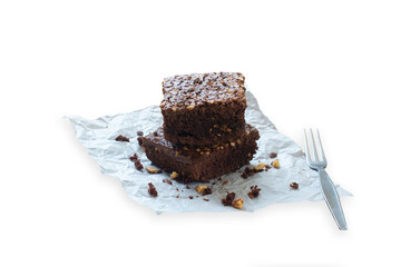 Two chocolated brownies cake isolated on white background.