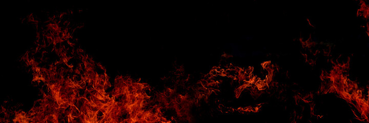Fototapeta na wymiar Flame of fire on a black background 