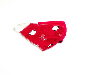 Fabric face mask red color isolated on a white background. Concept of coronavirus outbreak and...