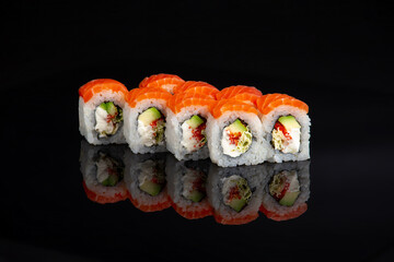salmon sushi roll philadelphia on black