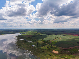 Naklejka premium Drone shot aerial view scenic landscape of river reservoir dam and the forest