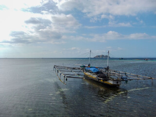 Naklejka na ściany i meble Stunning view, a boat wreck at Pulo Beach, Mesah Island Flores Indonesia
