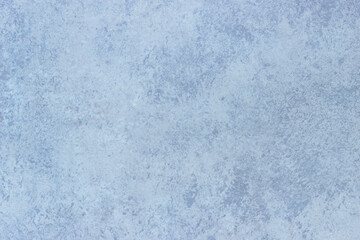 The texture of the pattern of blue floor tiles with imitation of marble.