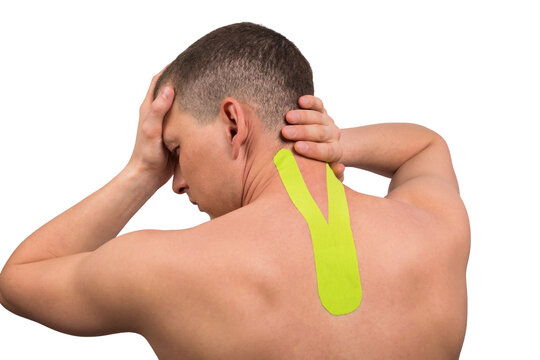 green medical tape is glued according to the instructions to the neck area to relieve pain and tension in it, hands hold pain, isolated on white background