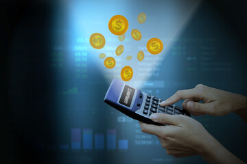 Accountants calculating profit - closeup shot of hands Press calculator 