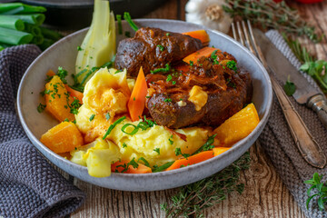 italian meat dish with vegetables and potatoes