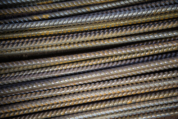 The bars of the iron rebar lie on the surface