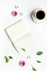 Fototapeta na wymiar Notebook with cup of coffee on white background top view mockup