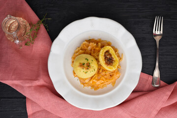 Potato dumpling stuffed with greaves