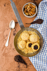 Sweet dumplings with dried pears and nuts