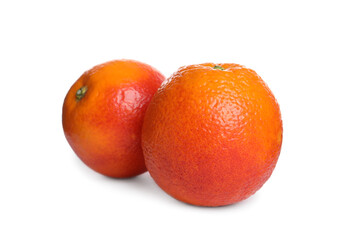 Whole ripe red oranges isolated on white