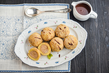 Chestnut dumplings with chocolate sauce