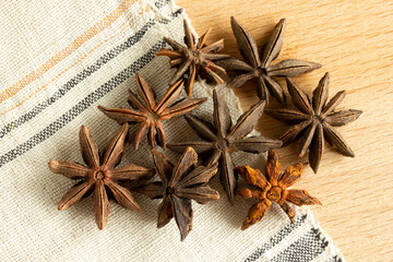 star anise on linen fabric
