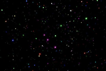 Shiny multicolored glitters scattered in space on black background. Use Screen mode to blend on your design. 3D illustration