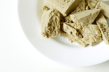 slices of sweet sunflower halva on white plate